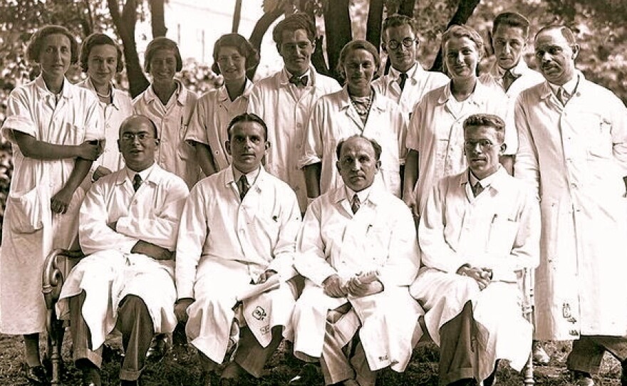 Asperger, in the bottom row, far right, with other staff members at the Children's Clinic, realized in the 1930s that autism was a spectrum of disorders that conferred both disability and ability.