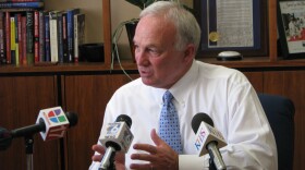 San Diego Mayor Jerry Sanders talks to reporters about the state's budget crisis on July 2, 2009.