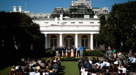 U.S. President Barack Obama (C) delivers a statement demanding that Congress to pass extensions of transportation and avaition bills with labor, business and political leaders and workers who would be affected if Congress fails to act in the Rose Garden August 31, 2011 in Washington, DC.