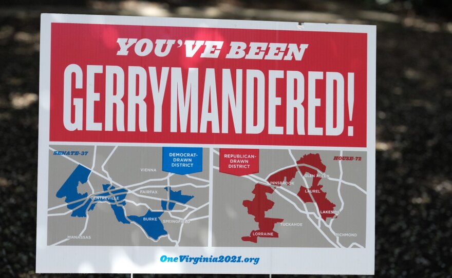 Redistricting reform advocates in Virginia pitched the creation of a new commission as a remedy to unfair political maps, like the ones shown on this poster from 2019, but the new group has struggled to reach consensus.
