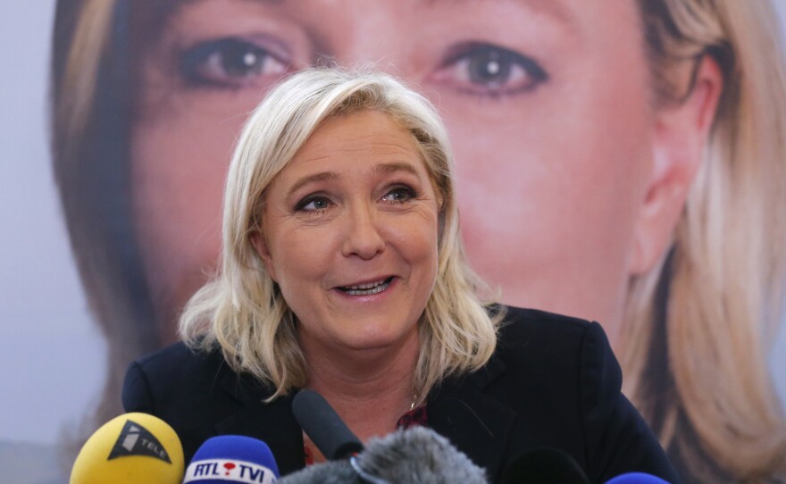 National Front party leader Marine Le Pen speaks during a news conference Monday in Lille, France. She has been acquitted of inciting hatred during a 2010 campaign.