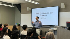 Dr. Bryant Lin teaches a lung cancer class in fall 2024. He says he was very nervous to teach the first class and share his story.