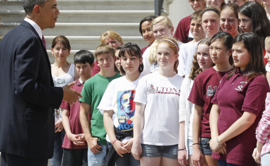 President Obama meets middle school students from a Longmont, Colo. at the White House, April 11, 2011.