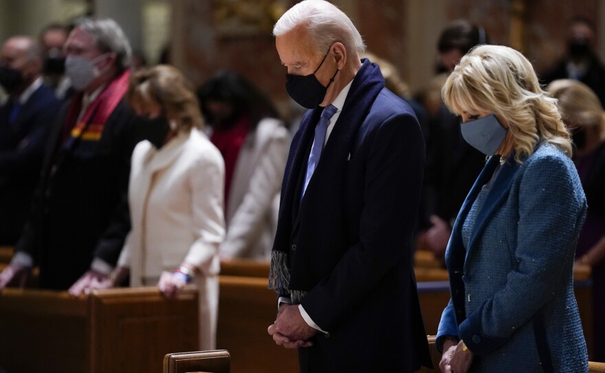 President Joe Biden and his wife, Jill Biden, shown here on Jan. 20, 2021, attend Mass at the Cathedral of St. Matthew the Apostle during Inauguration Day ceremonies in Washington, D.C.