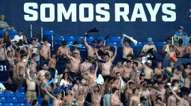 Tampa Bay Rays fans cheer on the team during the eighth inning of a baseball game against the Baltimore Orioles Monday, May 18, 2026, in St. Petersburg, Fla.