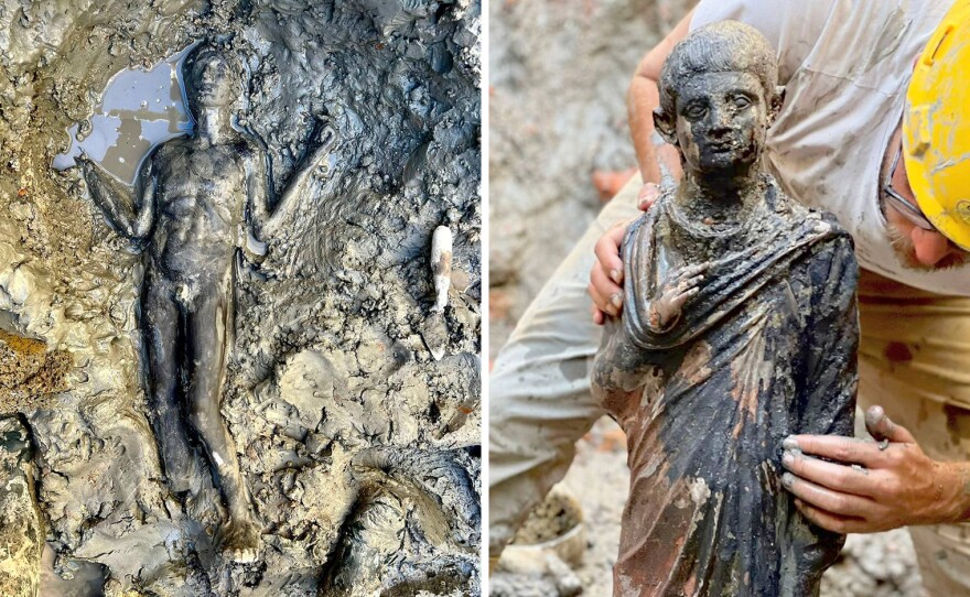 Statues at the site of the discovery of two dozen well-preserved bronze statues from an ancient Tuscan thermal spring in San Casciano dei Bagni, Italy on Nov. 3.