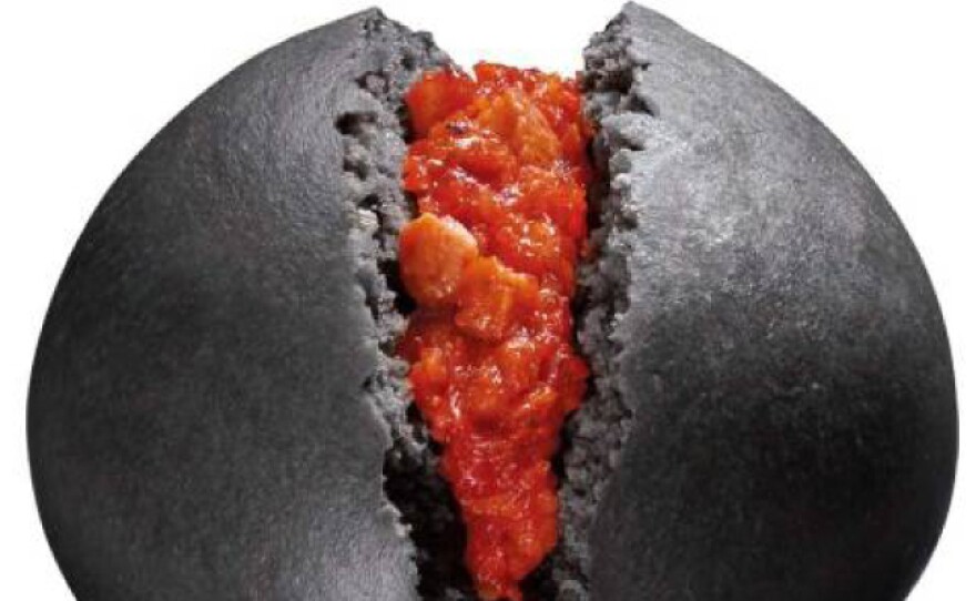 Like dragon eggs stuffed with fiery peppers: KISS steamed buns will hit convenience store shelve in Japan next week. The buns are seen here in a news release from the Circle K Sunkus chain.