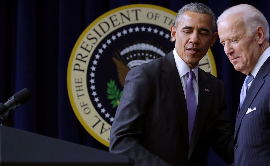 President Obama and then-Vice President Joe Biden appear at a bill signing in Dec. 2016. Late in his term, Obama was using executive actions to advance much of his agenda in the face of congressional opposition. President Trump was unapologetic about taking such actions, which some Democrats think should be Biden's approach.