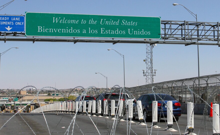 Drivers line up in the border city of Juárez in Mexico's Chihuahua state, as they attempt to cross the border at El Paso, Texas. The Guatemalan consul has confirmed that a Guatemalan boy apprehended with his mother last month had died Tuesday night.
