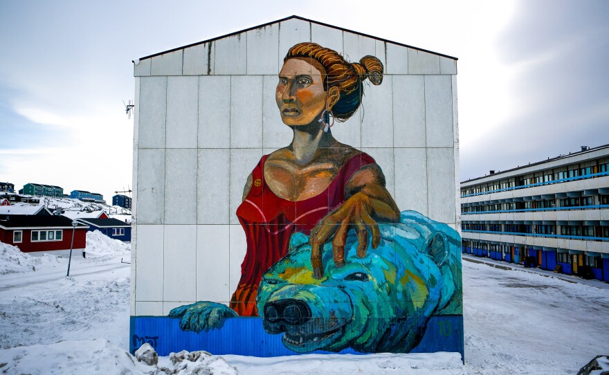 An artist's rendering of the Woman of the Sea, part of an Inuit legend, decorates an apartment block in downtown Nuuk, Greenland. Although Inuit culture was beaten down by Danish colonizers, it's now changing and thriving.