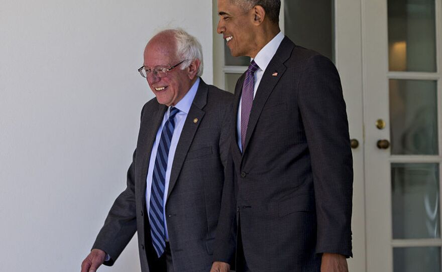 President Obama and Sen. Bernie Sanders walk to the Oval Office of the White House on Thursday.