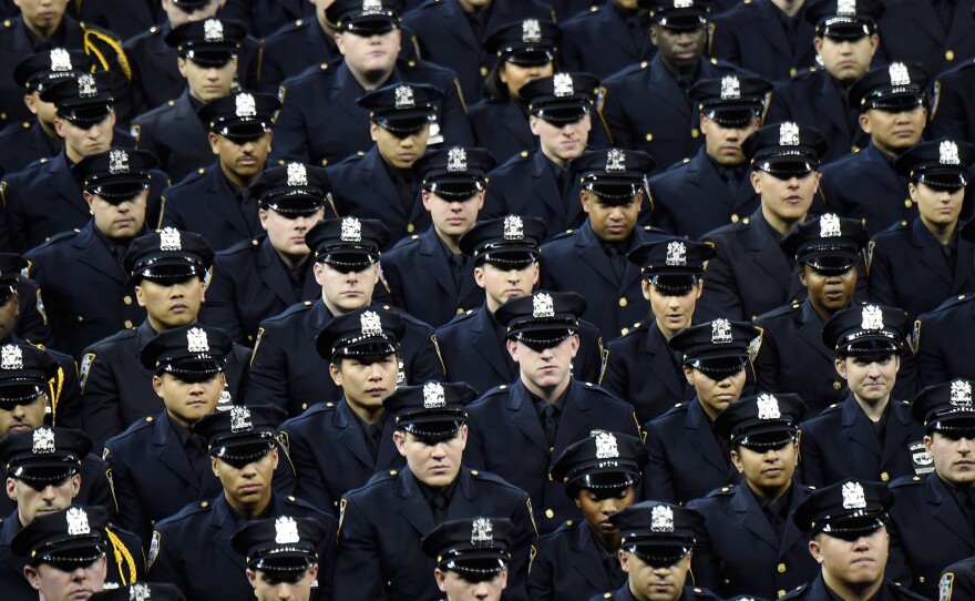Cadets stand during the New York Police Department graduation ceremony at Madison Square Garden on Monday.