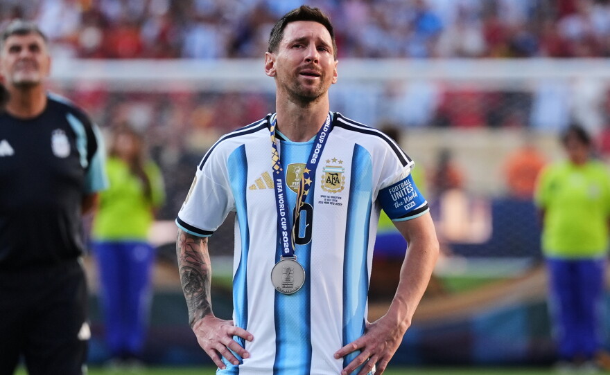 Argentina's Lionel Messi cries at the end of the award ceremony following Spain's 1-0 victory in the World Cup final. He ended the tournament with 8 goals and 4 assists, finishing in second place of the Golden Boot award for top scorer.