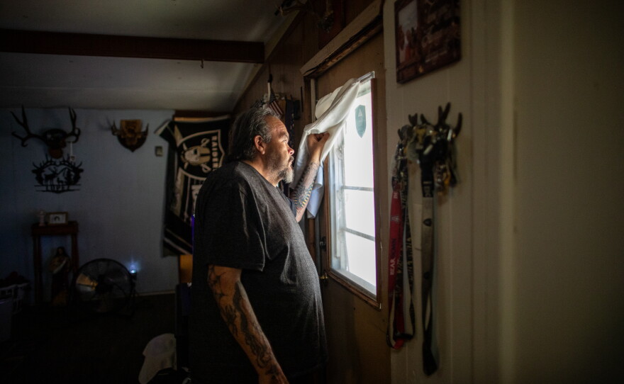 Paul Valdez has many strategies to keep his home cool, like keeping windows drawn most of the time. But there's little he can do if the power goes out.