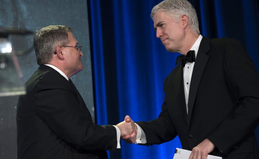 Leonard Leo welcomes Supreme Court Associate Justice Neil Gorsuch for a speech at the Federalist Society's 2017 National Lawyers Convention in 2017.