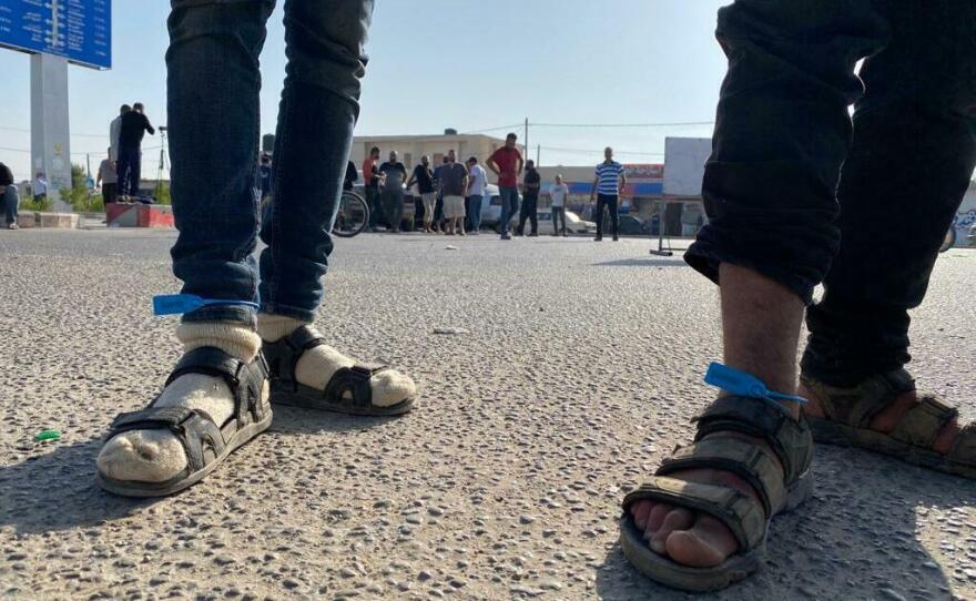 Gaza laborers working in Israel when the war began were rounded up and detained by Israeli authorities, and on Friday were sent back to Gaza with ankle tags numbering them.