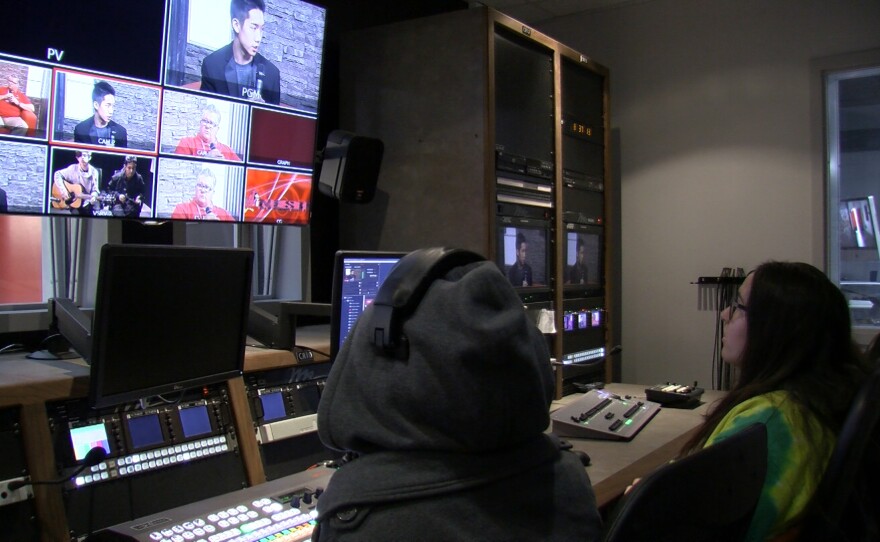 Students at Hoover High School monitor an on-set interview from the control room, Jan. 23, 2017.