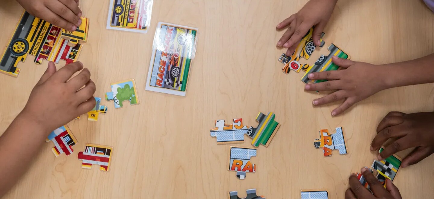 Students work on puzzles in the transitional kindergarten program at Westwood Elementary School in Stockton on Sept. 22, 2023.