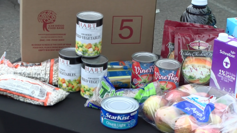 Pictured, a 40-pound box of food including canned goods, fresh fruit, milk and cheese. Boxes like this one were distributed by the San Diego Food Bank through its Senior Food Program. Chula Vista, Calif. Feb. 24, 2023. 