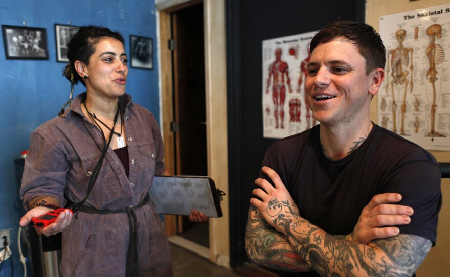 Dy Elise has Casey Raub come in for a couple of low-intensity, 20-to-30-minute sessions a week to strengthen the areas that are fatigued through bartending, like his lower back.