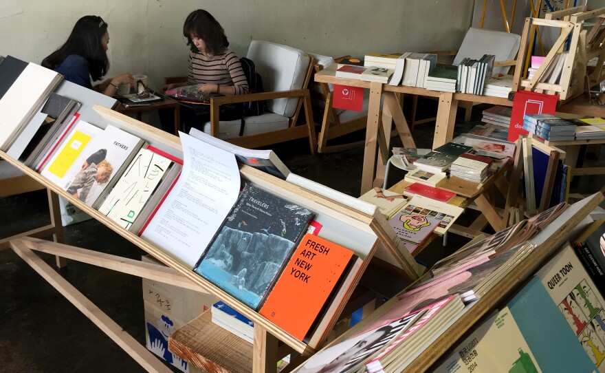 Seoul's Takeout Drawing cafe is at the heart of a property dispute between the artists who run it and rapper PSY, who owns the building it's in.