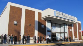 Unemployed workers line up to search for work at the Job Connect office in Las Vegas.