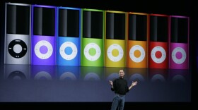 Apple's then-CEO, Steve Jobs, introduces new colors for the iPod Nano during a product announcement in San Francisco in September 2008.