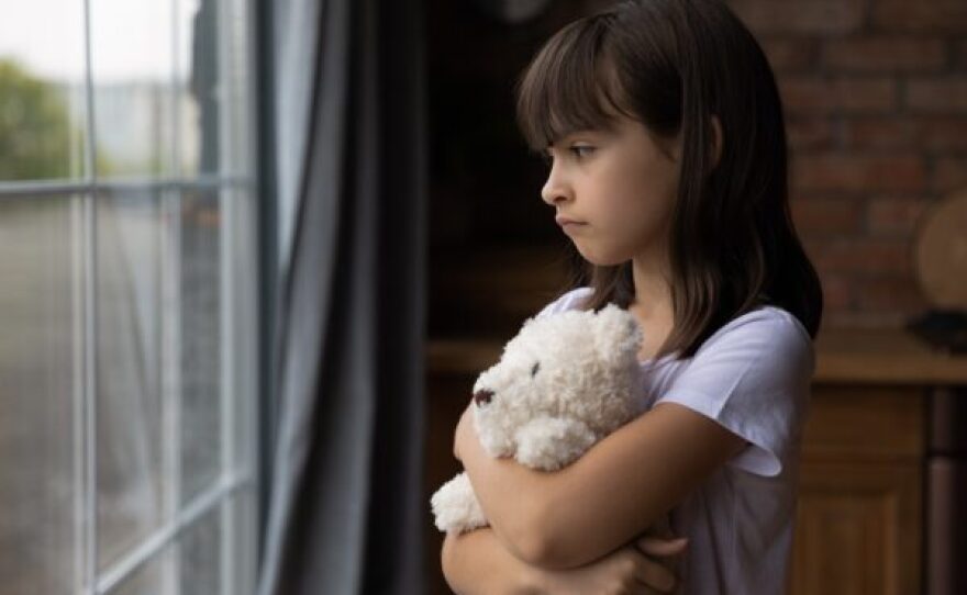 little girl and teddy bear