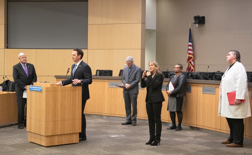 San Diego County Supervisor Nathan Fletcher speaks at a news conference on the coronavirus pandemic. To his right is then-Board of Supervisors Chairman Greg Cox, March 19, 2020.