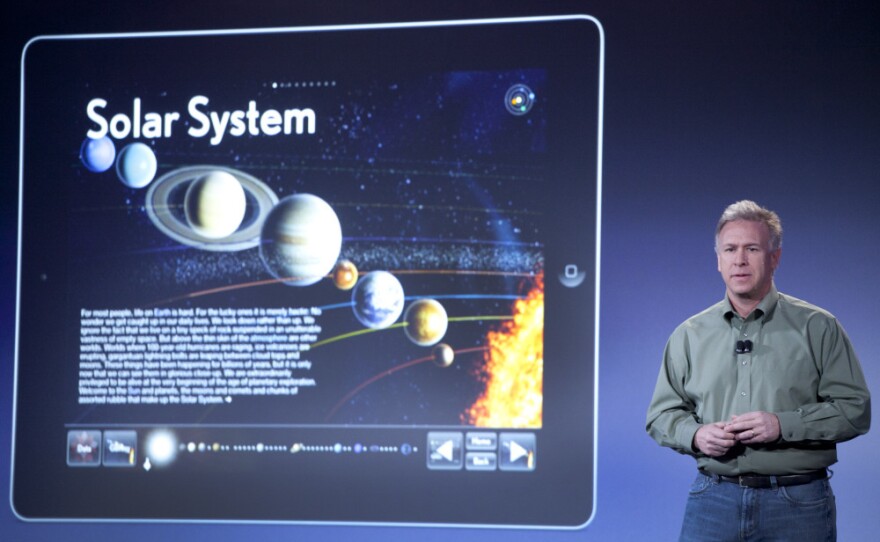Apple's Philip Schiller discusses iBooks 2 for iPad at a launch for the company's new textbook initiative in New York on Thursday. Apple also released iBooks Author, a tool meant to lure publishers into creating new content specifically for the iPad.