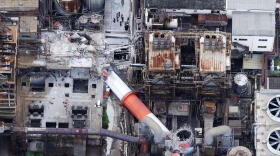 This aerial image shows a damaged chimney of the Nippon Paper Industries Co.'s Yatsushiro factory, following an earthquake in Yatsushiro, Kumamoto Prefecture, Wednesday, July 29, 2026.