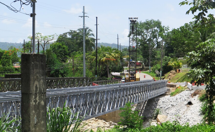 In Utuado, Puerto Rico, construction work is still going on to replace a bridge destroyed in Hurricane Maria.