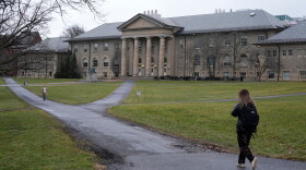 People walk on the campus of Cornell University in Ithaca, N.Y., in 2024.