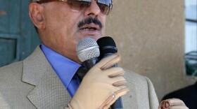 Yemeni President Ali Abdullah Saleh in a photo provided his office earlier this month. He wears gloves to protect his hands, which were injured during an assassination attempt earlier this year. 