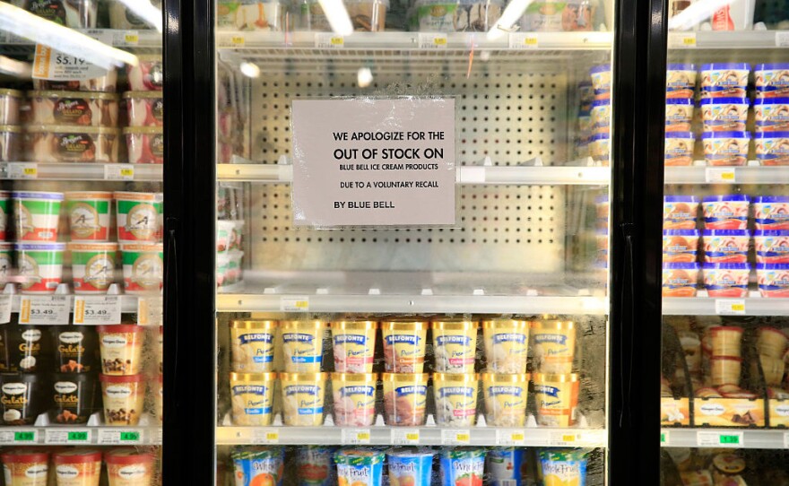 Shelves are bare and signs are posted where Blue Bell products were displayed in a grocery store in April 2015 in Overland Park, Kan. Blue Bell Creameries recalled all of its ice cream products following a listeria outbreak.