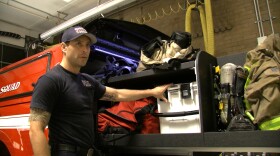 A Heartland Fire Rescue firefighter shows off the customized Squad 6 truck the department purchased six months ago, Aug. 21, 2018.