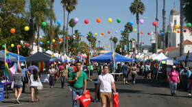 Attendees at the "Pride by the Beach" festival in downtown Oceanside, Oct. 11, 2014.
