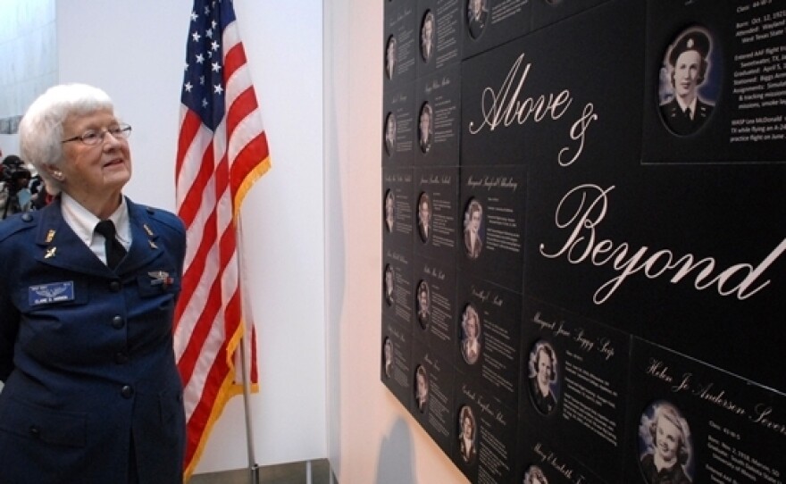 Elaine D. Harmon, a former pilot of the Women Airforce Service Pilots program, walks through the "Fly Girls of World War II" exhibit in 2008 at the Women in Military Service for America Memorial in Arlington, Va. Harmon was laid to rest at Arlington National Cemetery on Wednesday.