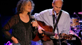 Carole King and James Taylor performing on stage together at the Troubadour nightclub in Los Angeles. (2007)
