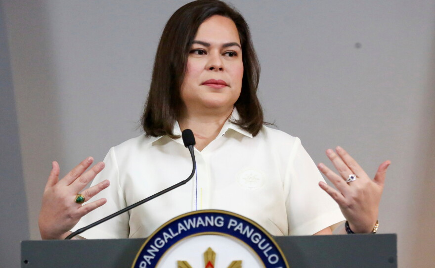FILE -Philippine Vice President Sara Duterte gestures as she speaks during a press conference in Manila, Philippines on Friday, Feb. 7, 2025.
