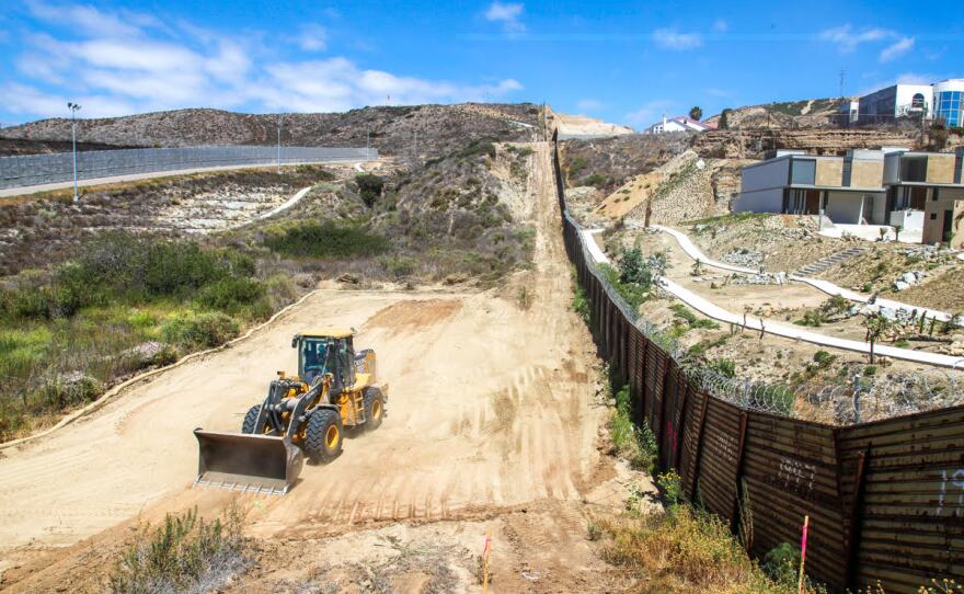 Bulldozer preparing the ground for border infrastructure replacement near Border Field State Park, San Diego May 31, 2018.