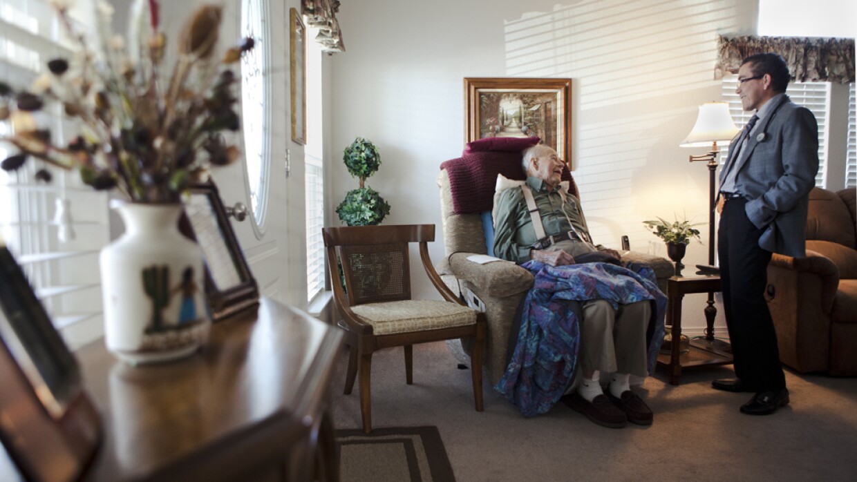 LC Sallis shares a laugh with his doctor, Daniel Hoefer, at his home on Jan. 10, 2013. LC is in stage four heart failure, and has opted to spend his remaining days in hospice care.