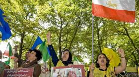 Supporters of the Mujahedeen-e Khalq, an Iranian exile group, demonstrate in front of the U.S. Embassy in The Hague, Netherlands, on Aug. 4, 2009. The U.S. State Department is reviewing the group's status on the Foreign Terrorist Organization list.