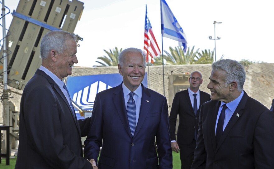 President Biden shook the hand of Israeli Defence Minister Benny Gantz during a tour of Israel's Iron Dome defense system.