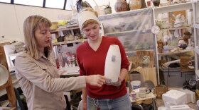 Professor Cary Esser (left) goes beyond teaching skills and techniques, preparing her students for a career in ceramics by mentoring them as they evolve from students to trained professionals. Pictured: Esser working with a ceramics student at the Kansas City Art Institute, Kansas City, Missouri.