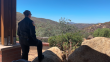 Cal Fire Forestry Technician Brandi McLaughlin surveys the open space in Jamul, California, on Aug. 19, 2025.