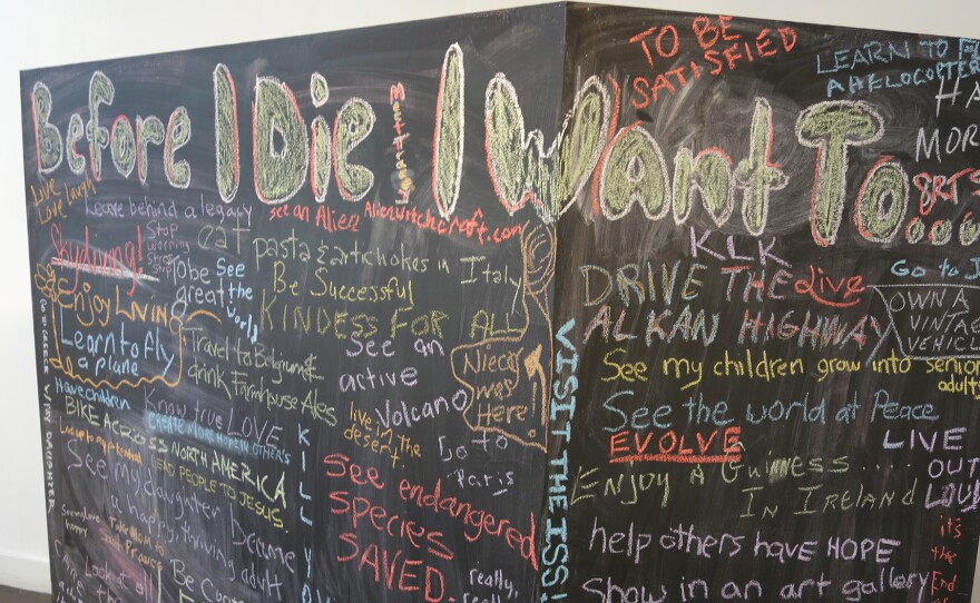 A chalkboard "bucket list" stirred imaginations and got people talking at an Indianapolis festival designed to help make conversations about death easier.