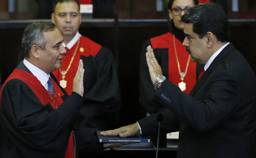 Venezuela's President Nicolas Maduro takes the oath of office in Caracas, Venezuela, on Thursday. Maduro starts his second term amid international denunciation of his victory and a devastating economic crisis.