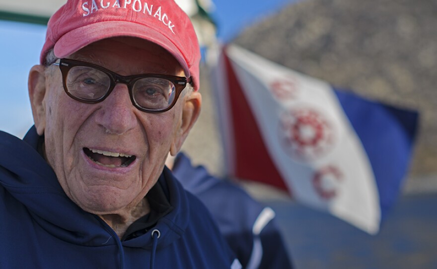 Walter Munk in Cabo Pulmo National Marine Park with Explorers Club flag in background, east coast of Mexico's Baja California Peninsula.