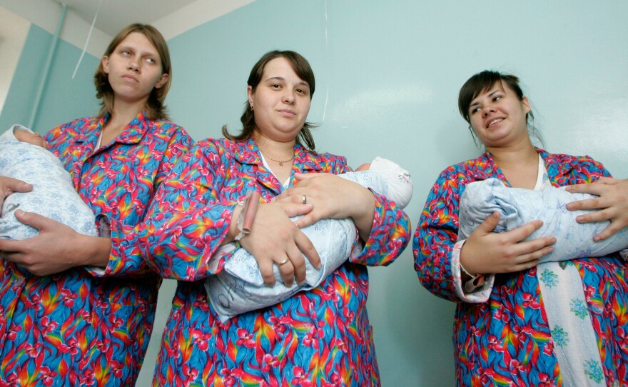 Women posed with newborns in Ulyanovsk, east of Moscow, in 2007. The local governor had urged residents to help boost Russia's low birthrate.